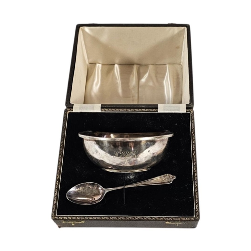 16 - AN EARLY 20TH CENTURY SILVER CHRISTENING BOWL AND SPOON
Plain form, hallmarked Birmingham, 1953, in ... 