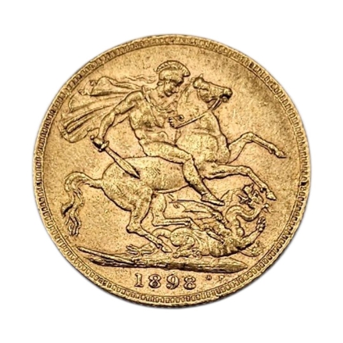 19A - A QUEEN VICTORIAN 22CT GOLD FULL SOVEREIGN COIN, DATED 1898 
With veiled portrait bust, George and D... 