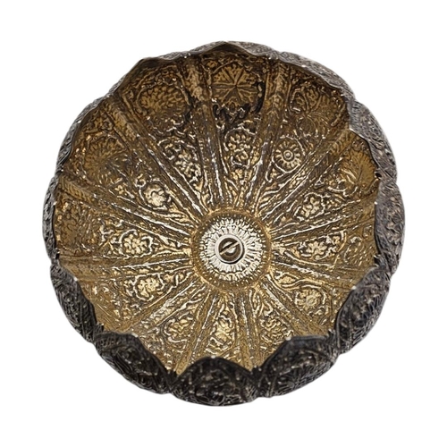 23 - A LATE 19TH CENTURY SOUTHEAST ASIAN REPOUSSÉ SILVER LOTUS BOWL
Featuring overlapping pointed petals ... 