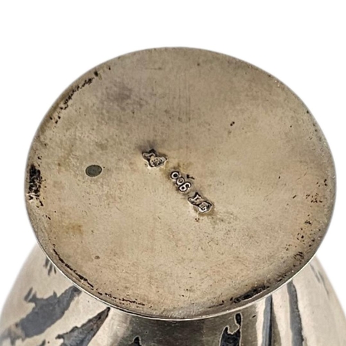 5 - AN EARLY 20TH CENTURY CONTINENTAL SILVER VASE
Scrolled fluted design, marked .900 to base.
(approx 1... 