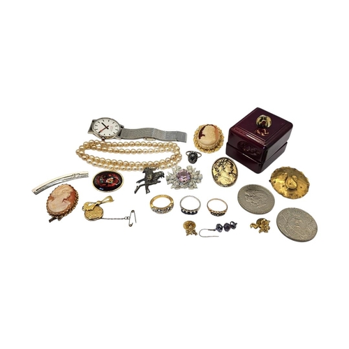 11 - A COLLECTION OF VINTAGE COSTUME JEWELLERY
To include two cameo brooches, a bow for locket and a marc... 
