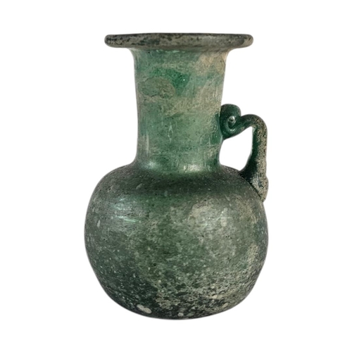 18 - AN EARLY 20TH CENTURY ‘ROMAN DESIGN’SODA GLASS JUG
Single handle with pitted iridescent finish.
(app... 