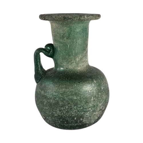 18 - AN EARLY 20TH CENTURY ‘ROMAN DESIGN’SODA GLASS JUG
Single handle with pitted iridescent finish.
(app... 