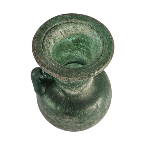 18 - AN EARLY 20TH CENTURY ‘ROMAN DESIGN’SODA GLASS JUG
Single handle with pitted iridescent finish.
(app... 