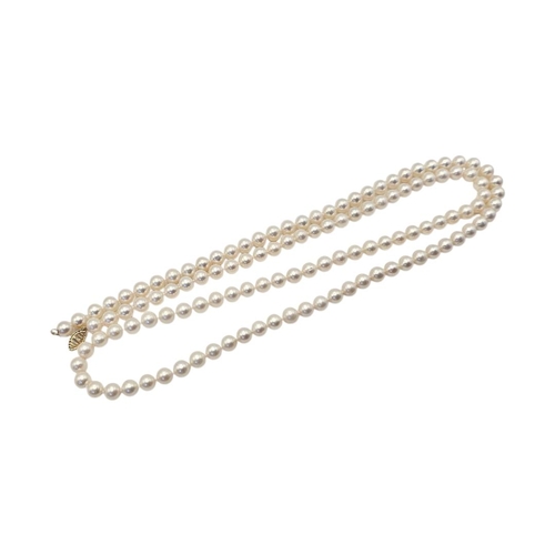 24 - A VINTAGE 14CT GOLD AND CULTURED PEARL NECKLACE
A row of pearls with pierced lozenge form clasp.
(lo... 