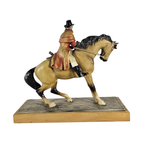 28 - AN ART DECO COLD PAINTED SPELTER NOVELTY ‘HIGHWAYMAN’ MATCH STRIKER
Likely ‘Dick Turpin’, mounted on... 