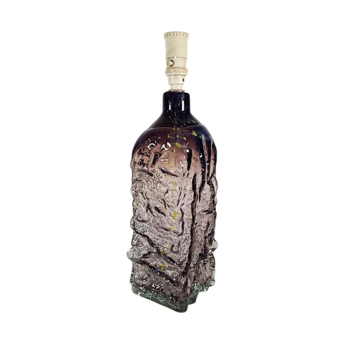 33 - A MID CENTURY ART GLASS TABLE LAMP
Textured design in the manner of White Friars with purple hue.
(a... 
