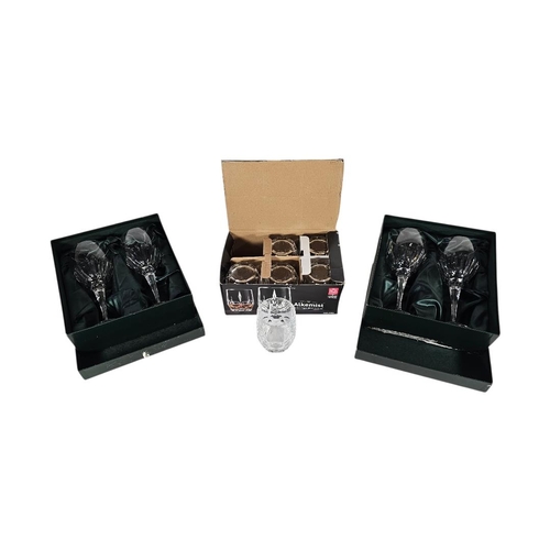 34 - THOMAS WEBB, A SET OF FOUR VINTAGE LEAD CRYSTAL WINE GLASSES
Fluted design to bowl, in original boxe... 