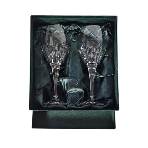 34 - THOMAS WEBB, A SET OF FOUR VINTAGE LEAD CRYSTAL WINE GLASSES
Fluted design to bowl, in original boxe... 