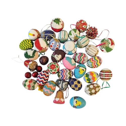 35 - A COLLECTION OF VINTAGE BEADWORK CHRISTMAS AND EASTER DECORATIONS
To include snowmen and Easter egg ... 