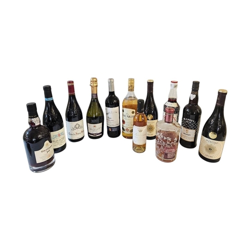 38 - A COLLECTION OF VINTAGE AND SELECTION OF SPIRITS
To include RIOJA RESERVA 2021, a bottle of CVNE, BA... 