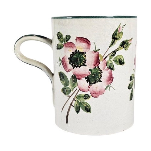 42 - WEYMSS WARE, A LARGE EARLY 20TH CENTURY 'WILD ROSE' POTTERY TANKARD
Hand painted in the desirable 'W... 