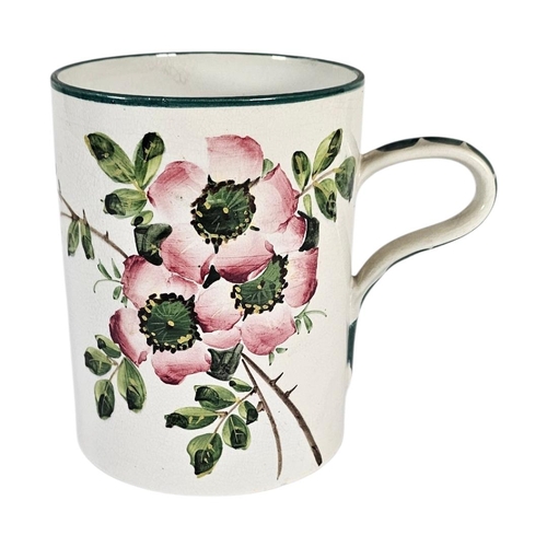 42 - WEYMSS WARE, A LARGE EARLY 20TH CENTURY 'WILD ROSE' POTTERY TANKARD
Hand painted in the desirable 'W... 
