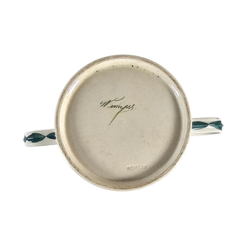 45 - A LARGE EARLY 20TH CENTURY WEMYSS ‘CABBAGE ROSE’ POTTERY LOVING CUP 
Twin handles with hand painted ... 