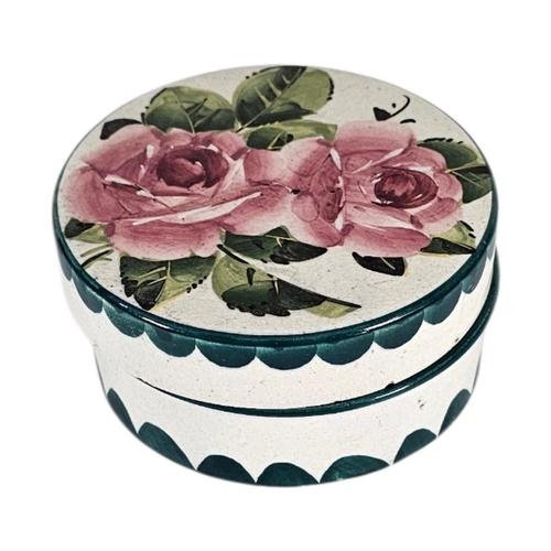 47 - WEMYSS WARE, AN EARLY 20TH CENTURY ‘CABBAGE ROSE’ POTTERY TRINKET BOX 
Circular form with handwritte... 