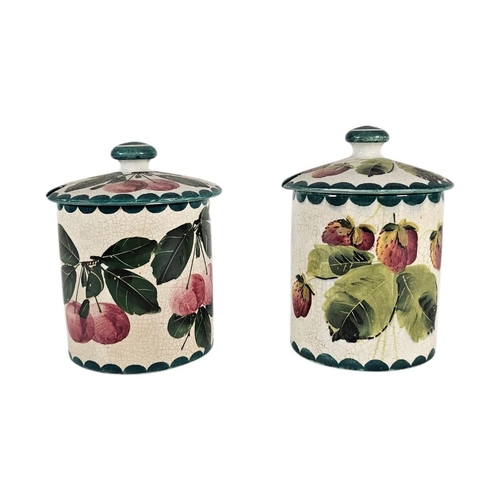 53 - WEMYSS WARE, TWO EARLY 20TH CENTURY ‘FRUIT‘ POTTERY PRESERVE POTS
Have painted decoration of strawbe... 