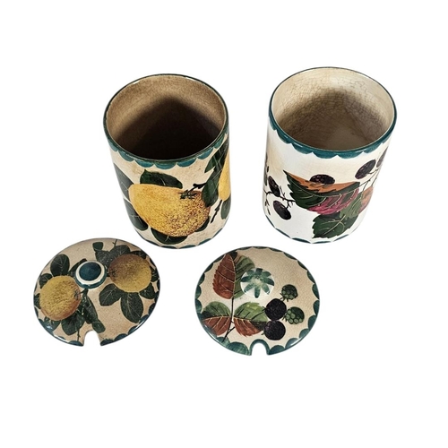 55 - WEMYSS WARE, TWO EARLY 20TH CENTURY ‘FRUIT‘ POTTERY PRESERVE POTS
Have painted decoration of strawbe... 