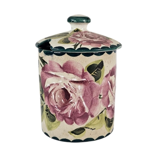 56 - WEMYSS WARE, AN EARLY 20TH CENTURY ‘CABBAGE ROSE’ POTTERY PRESERVE POT
Hand painted decoration with ... 