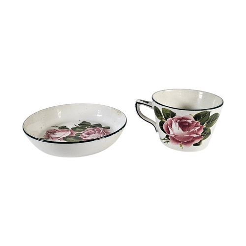 58 - WEMYSS WARE, AN EARLY 20TH CENTURY ‘CABBAGE ROSE ‘ POTTERY CUP AND SAUCER
Hand painted decoration wi... 