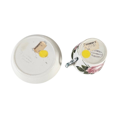 58 - WEMYSS WARE, AN EARLY 20TH CENTURY ‘CABBAGE ROSE ‘ POTTERY CUP AND SAUCER
Hand painted decoration wi... 