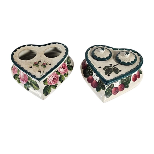 59 - WEMYSS WARE, TWO EARLY 20TH CENTURY POTTERY INKSTANDS
Heart form with twin inkwells, decorated with ... 