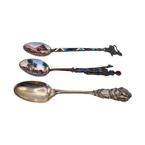 8 - TWO EARLY 20TH CENTURY EGYPTIAN SILVER AND ENAMEL SPOONS
Having figural decoration of the sound and ... 
