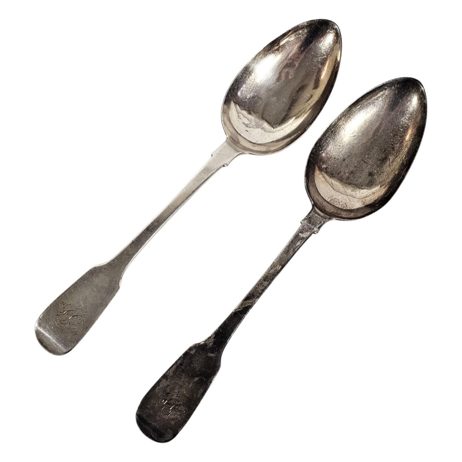 A PAIR OF GEORGIAN YORK SILVER TABLE SPOONS Plain form, with engraved ...
