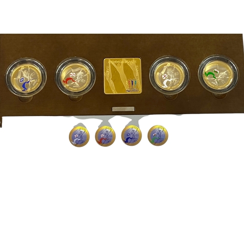 32 - 2002 Commonwealth Games 4-Coin Sterling Silver .925, Plated with Fine Gold and coloured.
Much as str... 