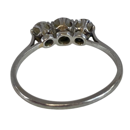 674 - Three Brilliant Cut Diamonds about 3.6 to 4.5mm Diameter set in a row of collets on a White Shank St... 