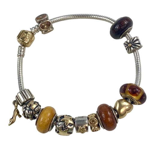 71 - Genuine Pandora Bracelet including 14ct Gold Charms in Box.


Viewing is available by appointment on... 