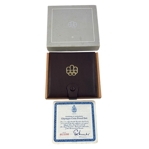 99 - 1976 Olympic 4 coin Silver set in Original case.
Practically as struck
134.55 grams .925 Silver.


V... 