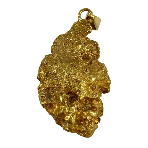 40 - Huge Gold Nugget XRF
Tests as 20-21ct with loop for wearing.
Weight 73.83 grams