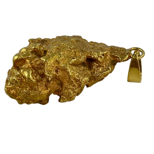 40 - Huge Gold Nugget XRF
Tests as 20-21ct with loop for wearing.
Weight 73.83 grams
