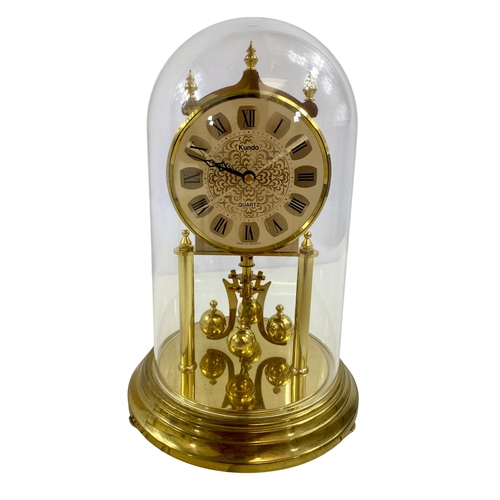 105 - A Kundo anniversary clock.