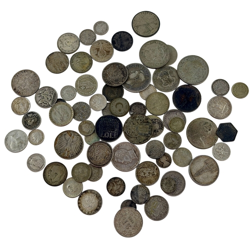 Hoard of foreign Silver coinage. Weight 375 grams.
