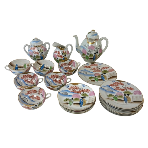 254 - **THIS LOT IS FOR COLLECTION ONLY**

Japanese Kutani Porcelain Tea service.
Part tea service, 20th c... 