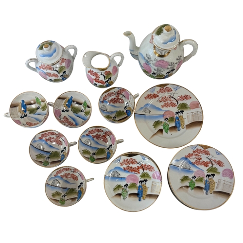 254 - **THIS LOT IS FOR COLLECTION ONLY**

Japanese Kutani Porcelain Tea service.
Part tea service, 20th c... 
