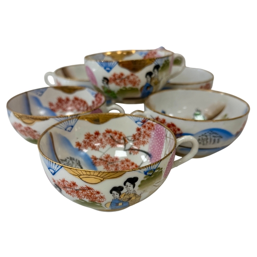 254 - **THIS LOT IS FOR COLLECTION ONLY**

Japanese Kutani Porcelain Tea service.
Part tea service, 20th c... 