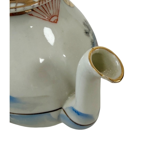 254 - **THIS LOT IS FOR COLLECTION ONLY**

Japanese Kutani Porcelain Tea service.
Part tea service, 20th c... 