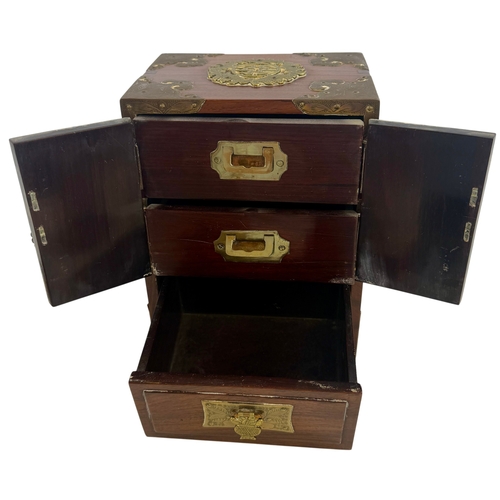 280 - Chinese style hardwood and brass mounted dressing table set, comprising a small cabinet with twin do... 