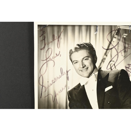 104 - LIBERACE (1919-1987) Original signature