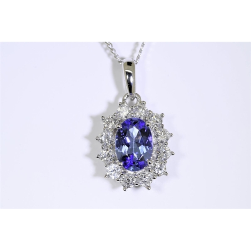 24 - Tanzanite & Diamond Pendant set in 18 carat white gold