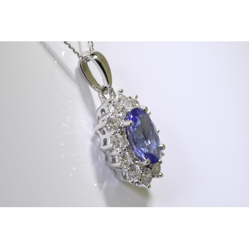 24 - Tanzanite & Diamond Pendant set in 18 carat white gold