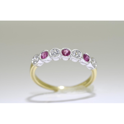 49 - Ruby & Diamond Ring set in 18 carat yellow gold.