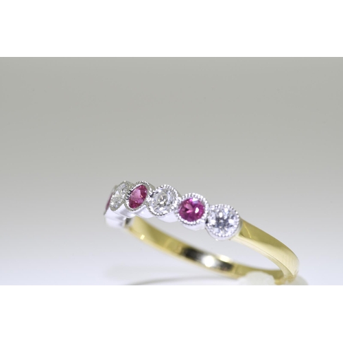 49 - Ruby & Diamond Ring set in 18 carat yellow gold.