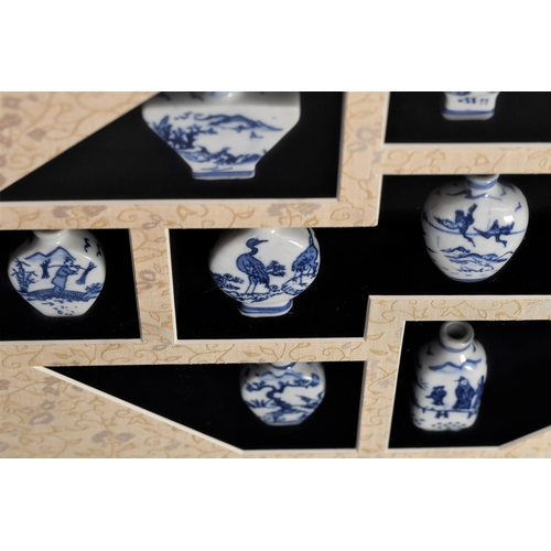 54 - Framed Set of Porcelain Vases