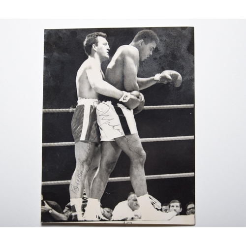 73 - Muhammad Ali v Brian London black & white photograph with original signatures.