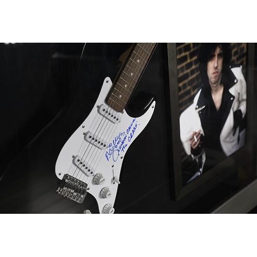 81 - Framed Guitar with Original Signature of Mick Jones from 