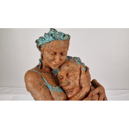 114 - Sculpture of Man and Woman Titled 