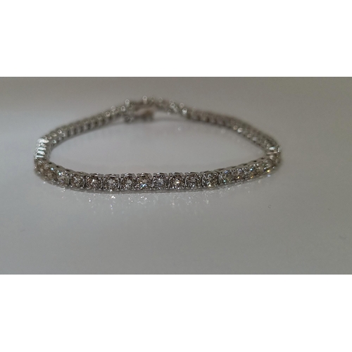 56 - 6.05 Carat Diamond Tennis Bracelet. Certified.